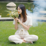 Balcony in Midtown Atlanta with THCA flower and preroll at sunset